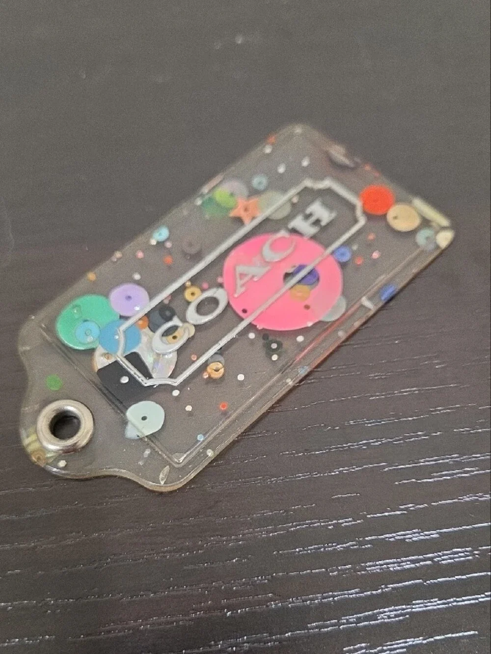Coach Clear Confetti Tag with Pink Logo Accent